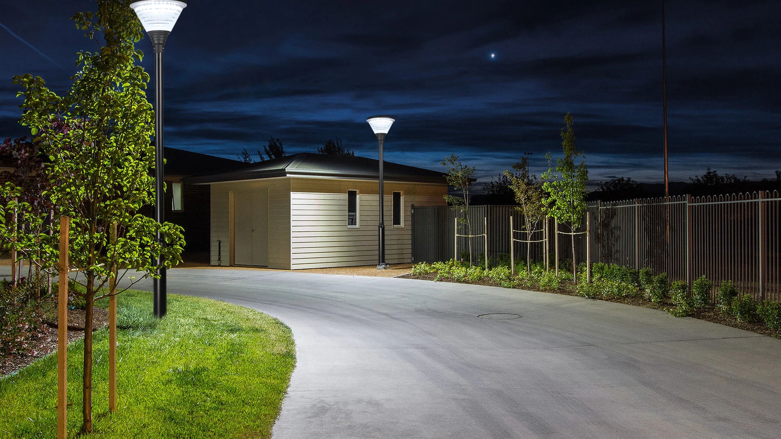 SGL-001 Hourglass garden light along green residential path