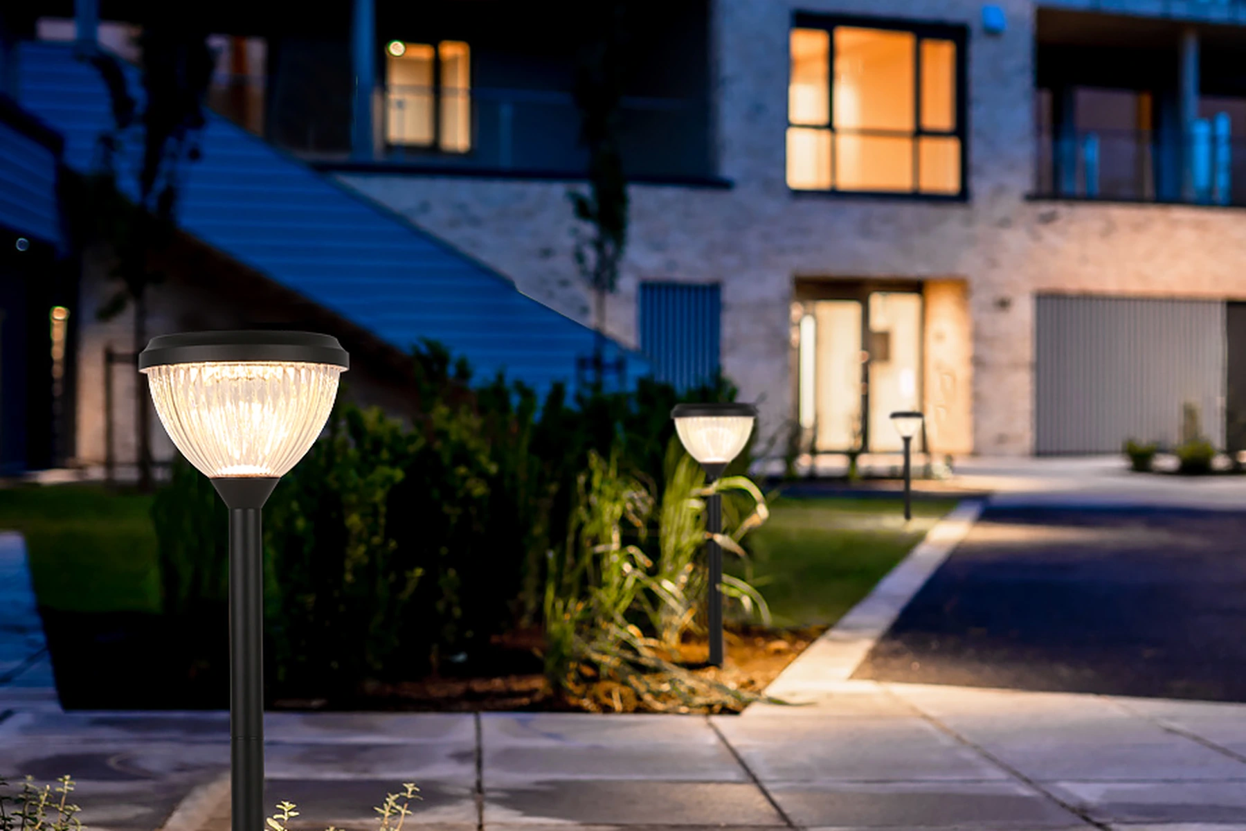 SLL-0705 pumpkin bollards defining lush lawn courtyard borders