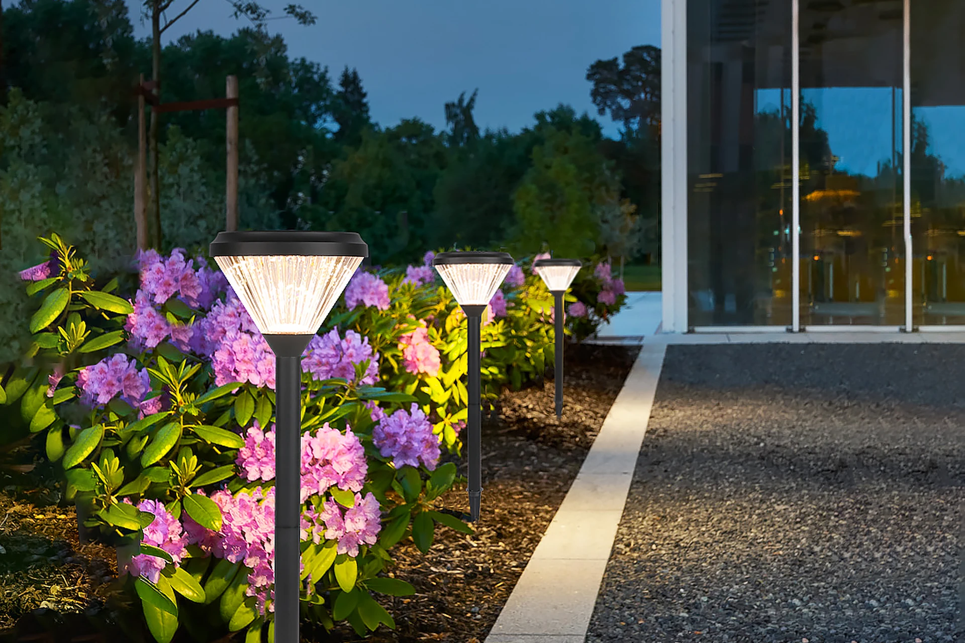 SLL-0804 diamond bollards defining lush lawn courtyard borders