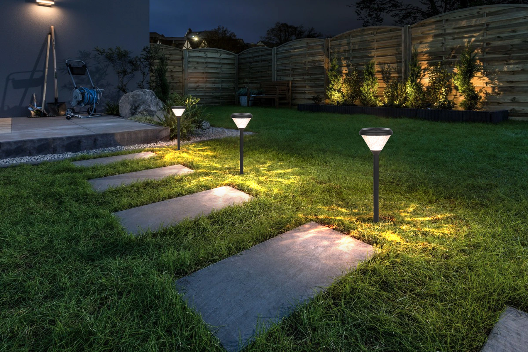 SLL-0907 teardrop solar bollards along manicured garden pathway