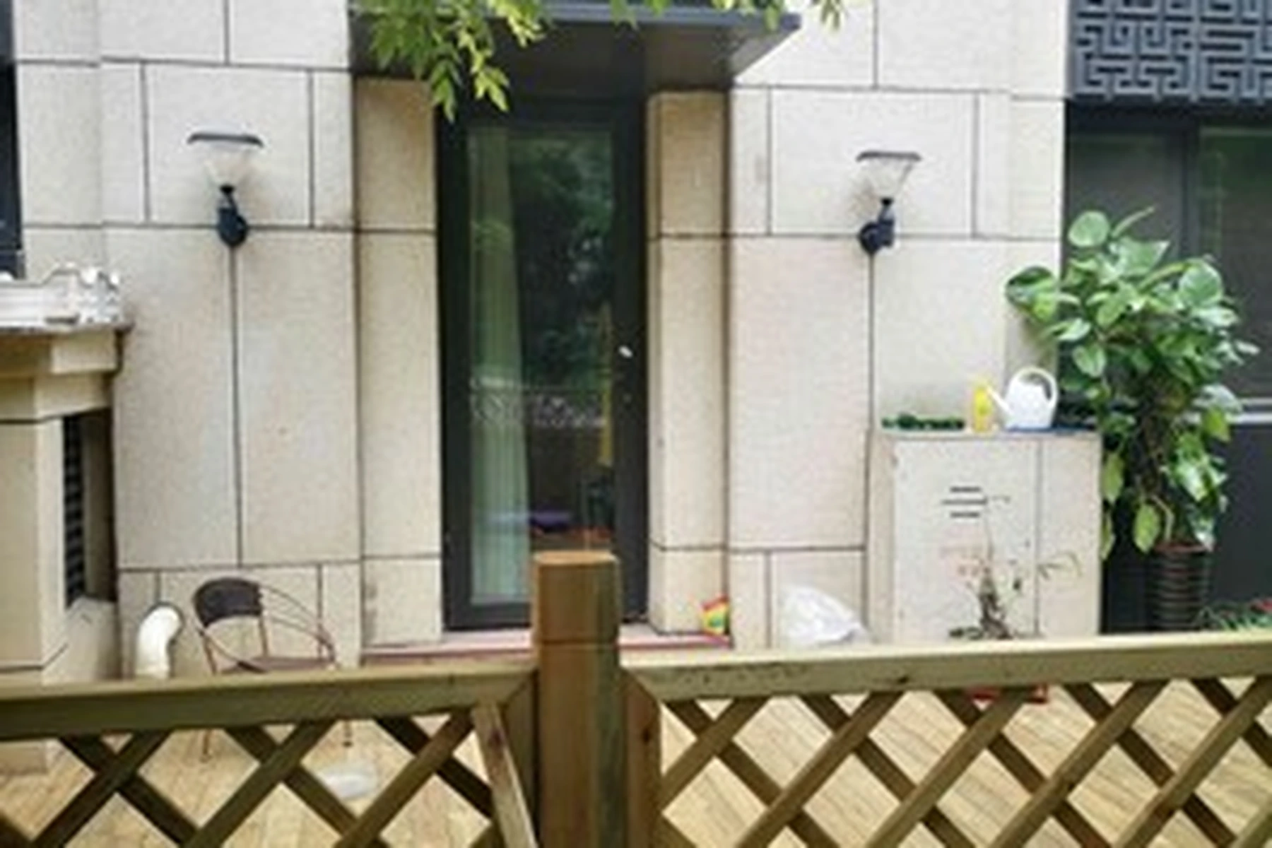 SWL-4005 wall lights installed along villa patio garden terrace and timber deck door
