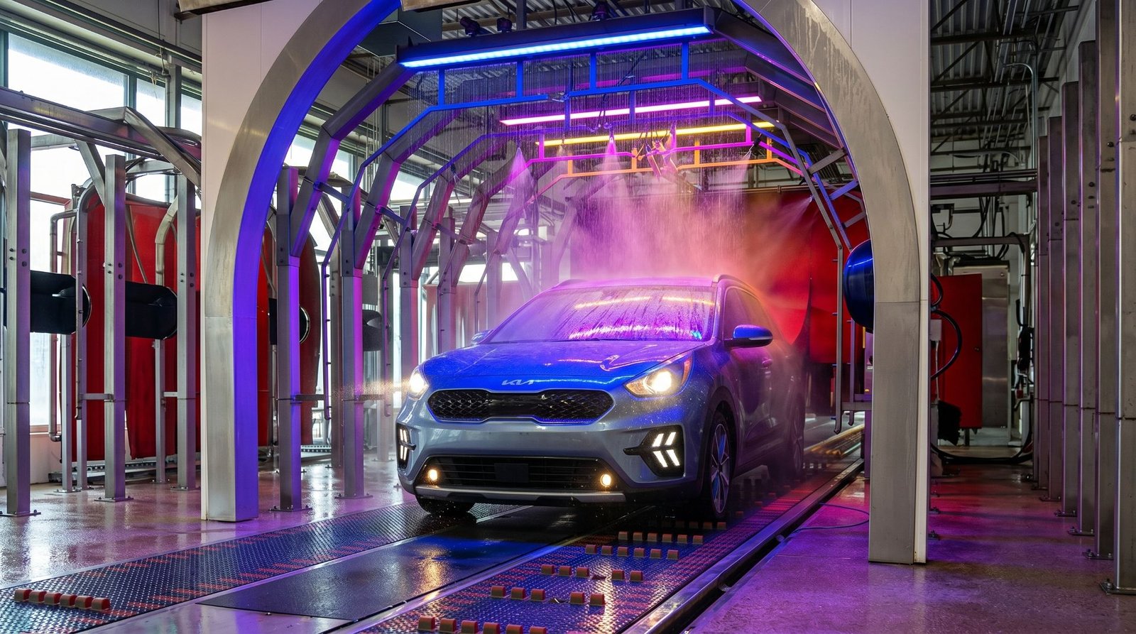 Impression 2 car wash tunnel arches with stacked RGB wall washer lights over a vehicle | TPK Lighting