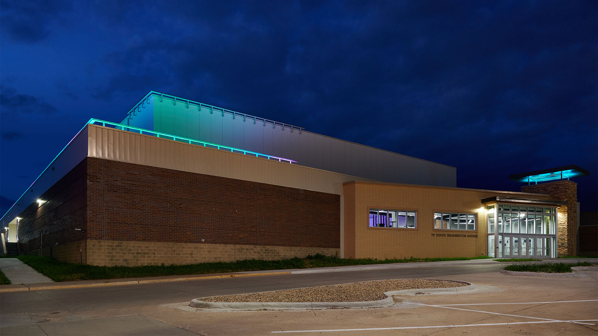 Dynamic multi-color building illumination for sports and entertainment venue