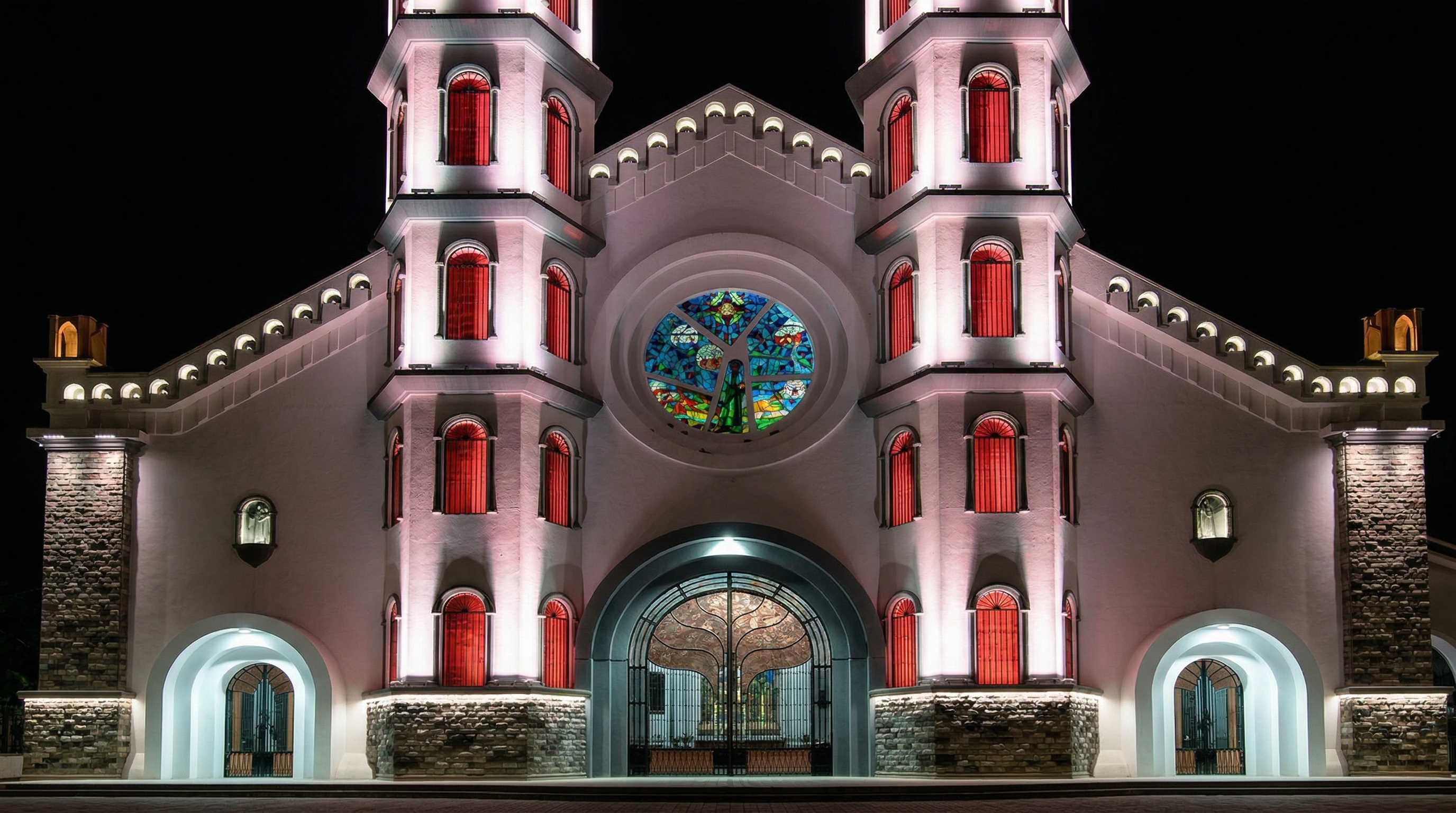 Vibrant LED illumination highlighting cathedral details and domes